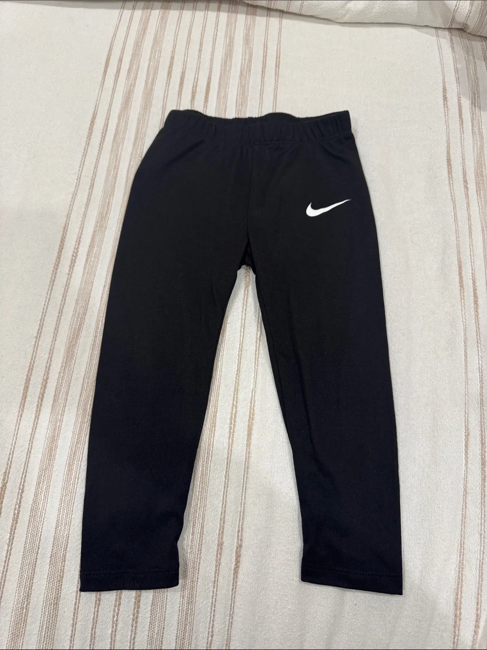 Nike Kids Black Leggings with White Swoosh